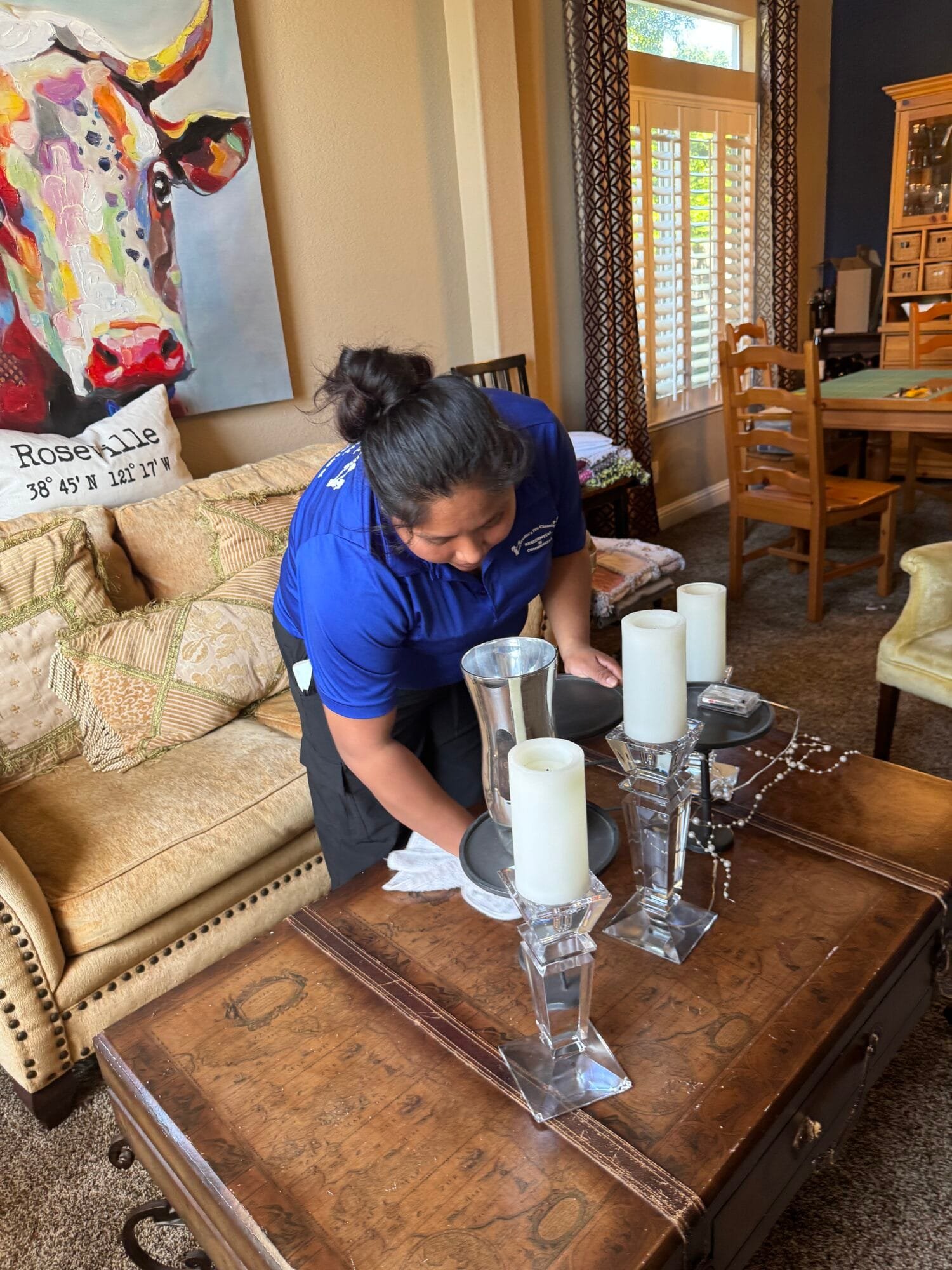 Deep cleaning service in Carmichael CA by Claudia's Pro Cleaning team cleaning living room and home surfaces