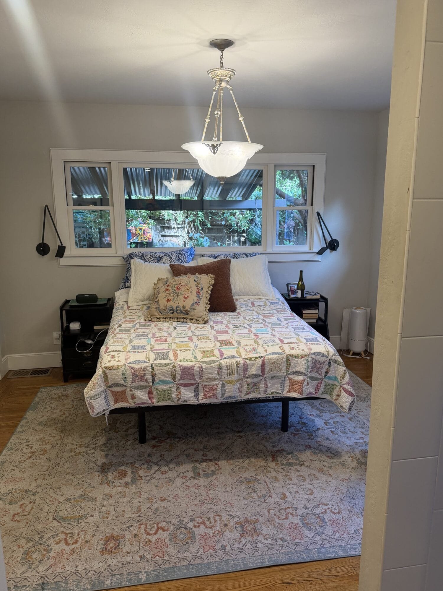 Bright bedroom with a neatly made bed